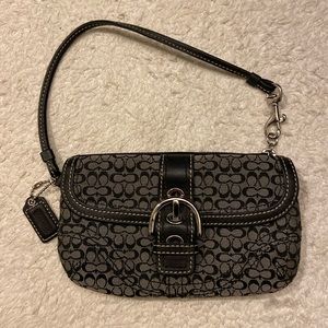 Small Black and gray Coach wristlet.